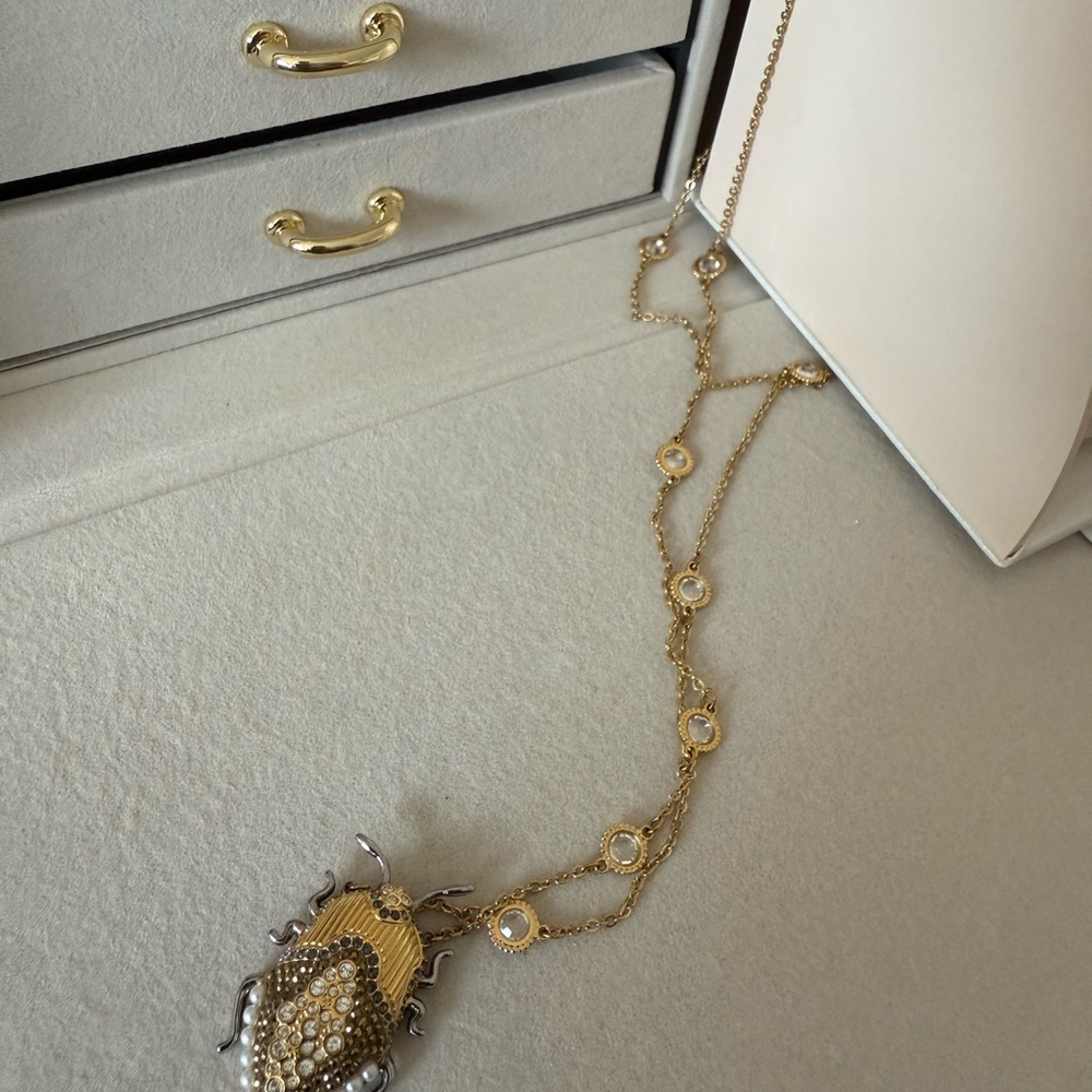 Elegant Gold and Silver Pendant Necklace